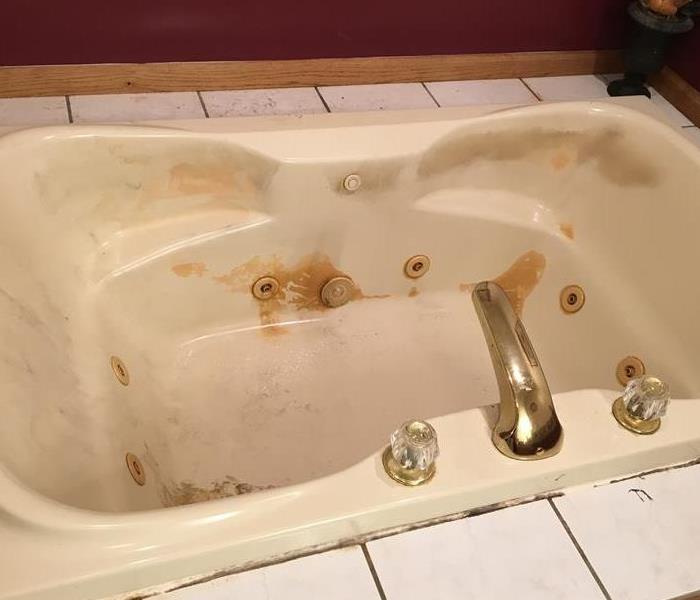 Bath Tub Damaged by Fire