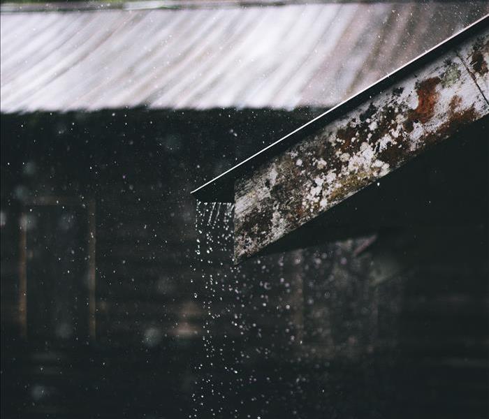 Image of rain hitting a roof